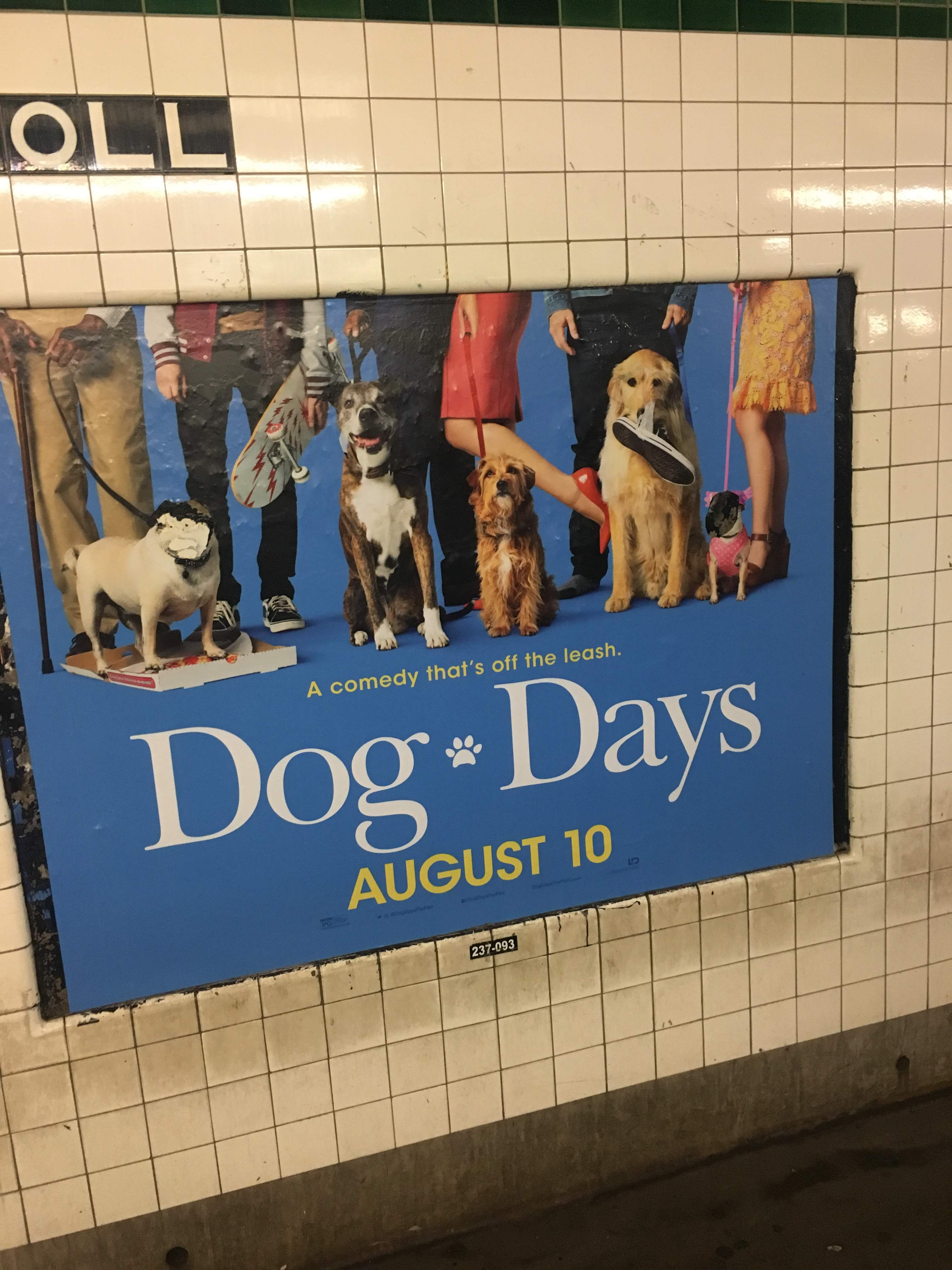 Subway wall poster for the film Dog Days: A comedy that's off the leash, August 10, showing owners and dogs.